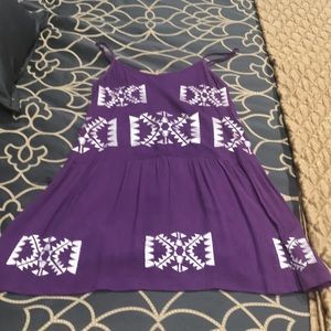 Tunic top. Low and higher in back.